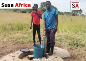 Below the Dvumako residents fect water from the flourishing wetland